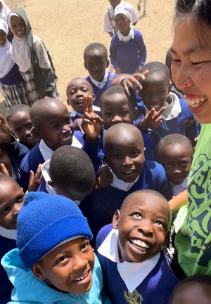 Cherie with a group of students in Kenya