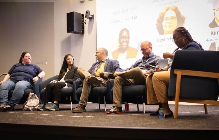 Panelists during panel discussion at the conference