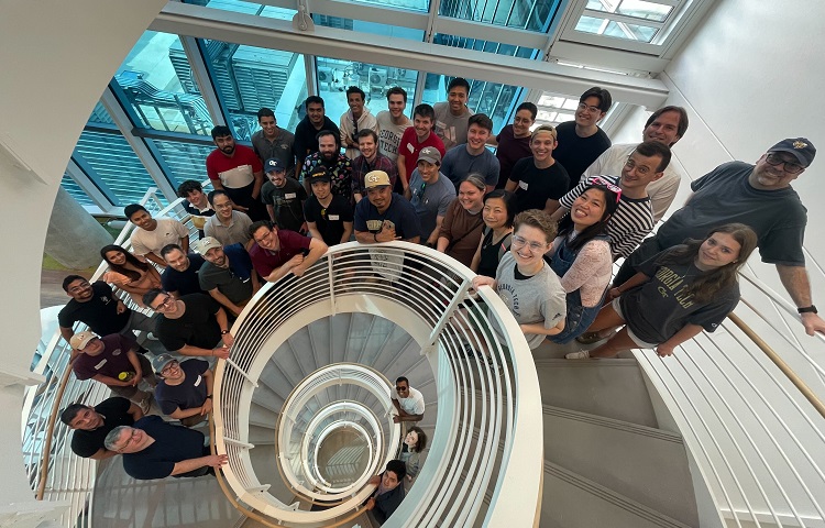People standing on spiral staircase