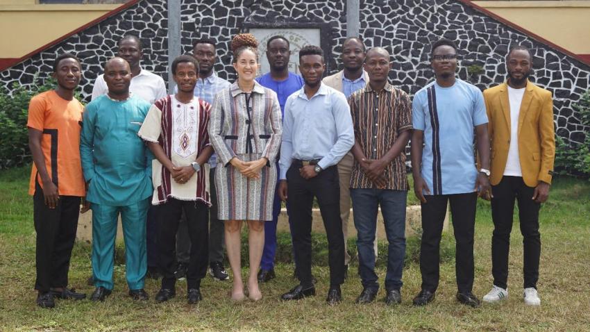 University of Liberia President Dr. Layli Maparyan is pictured outside with Liberian students starting the Georgia Tech Online Master Program in Computer Science