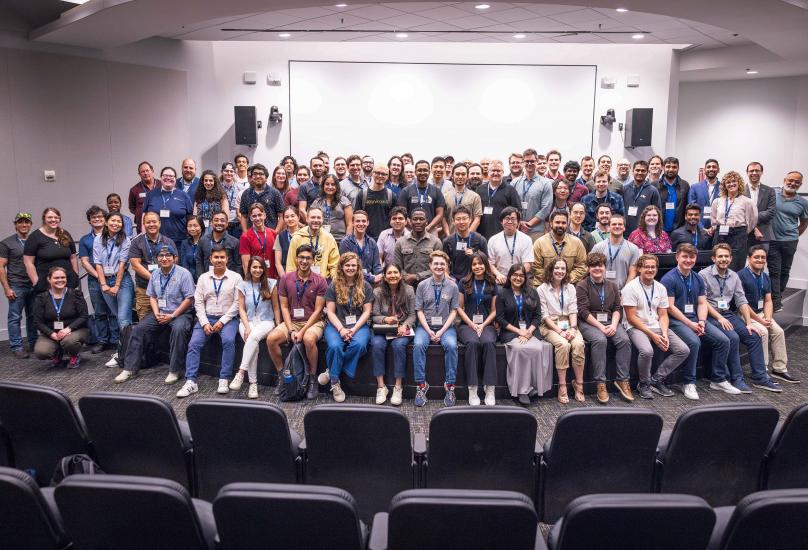 Conference attendees gathered on stage